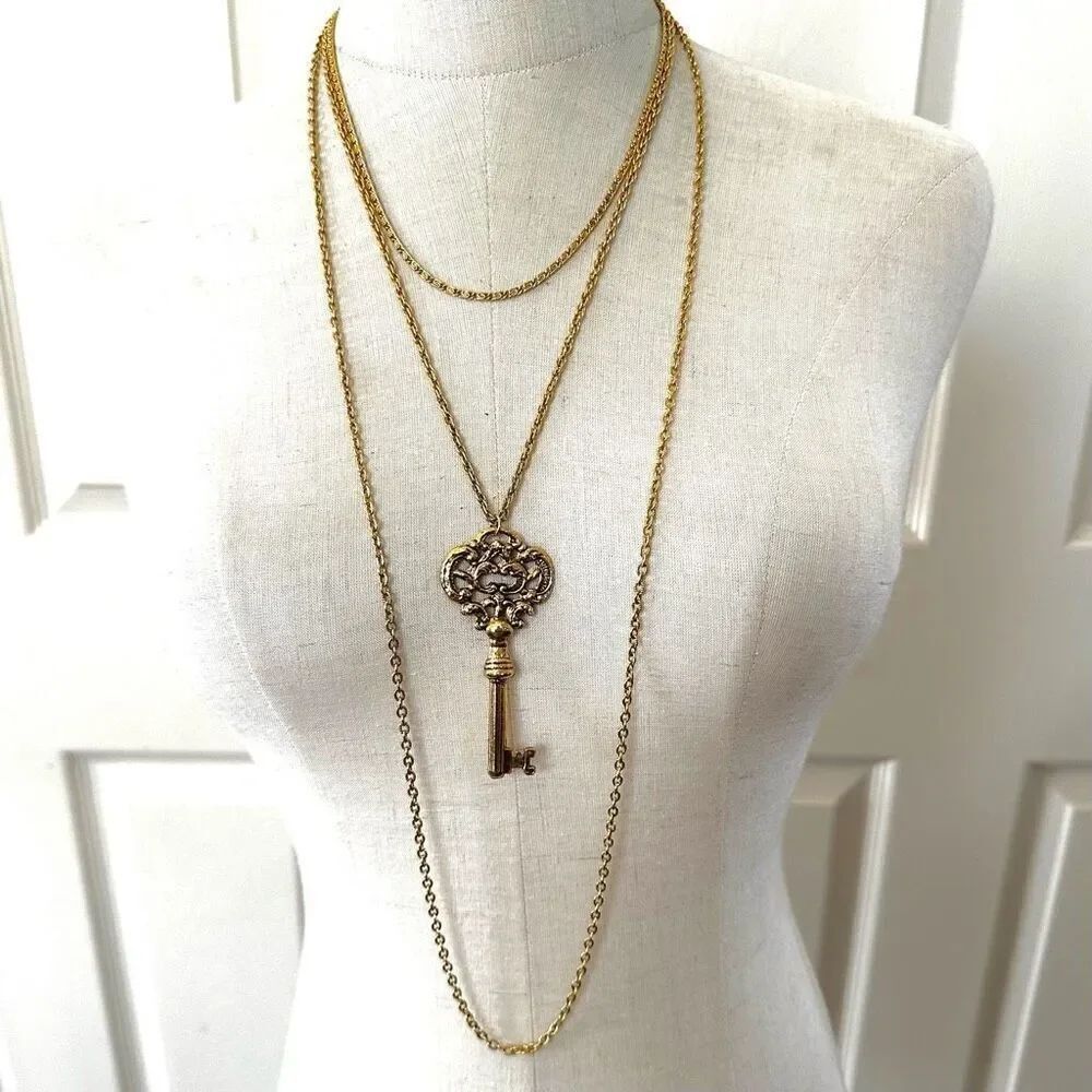 Sumthing Special multi chain gold tone key pendant necklace